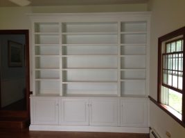 White empty Woodcraft shelves adding a minimalist and elegant touch to the room's interior design